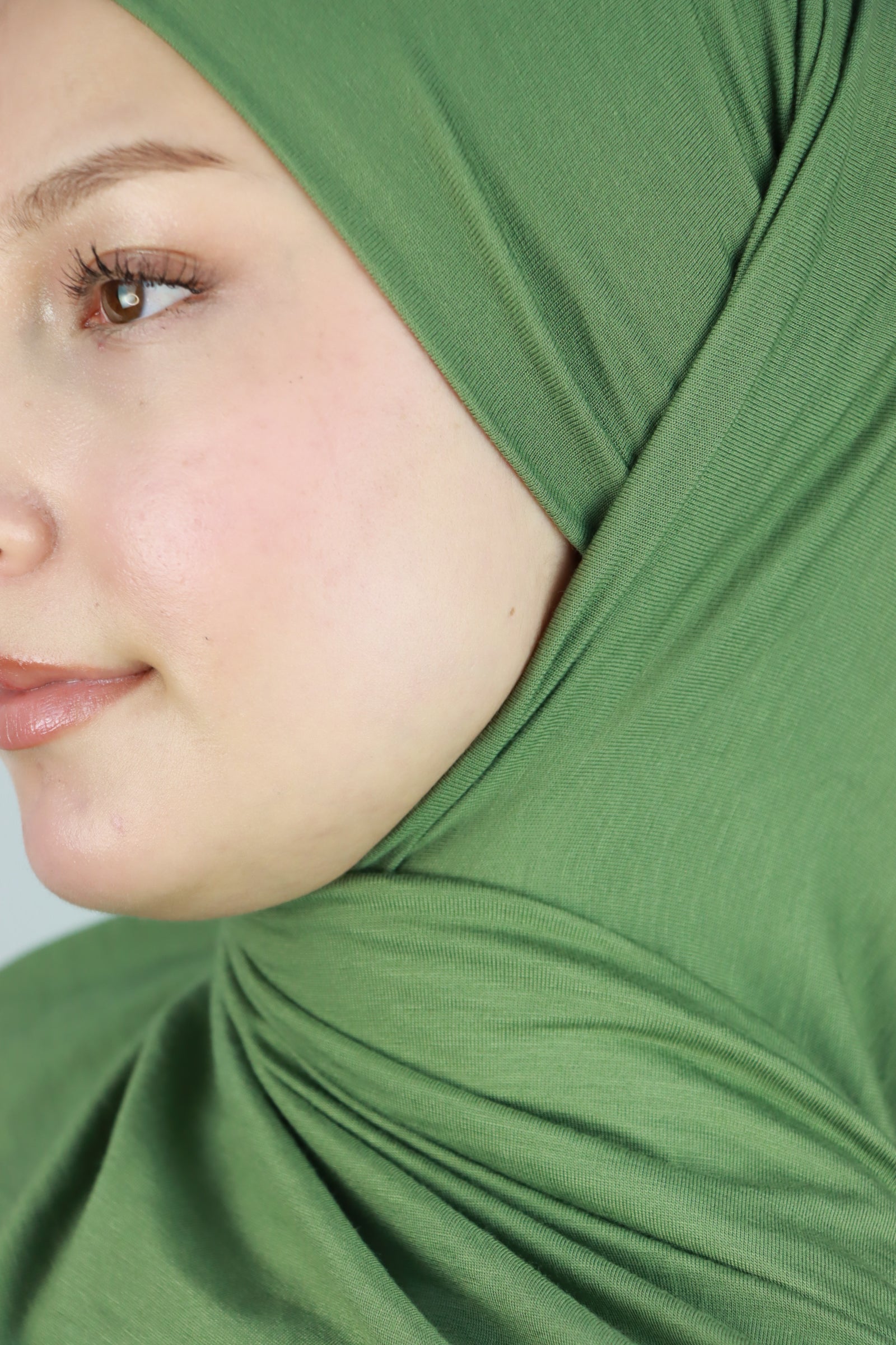 JERSEY WITH INTEGRATED BONNET IN OLIVE GREEN