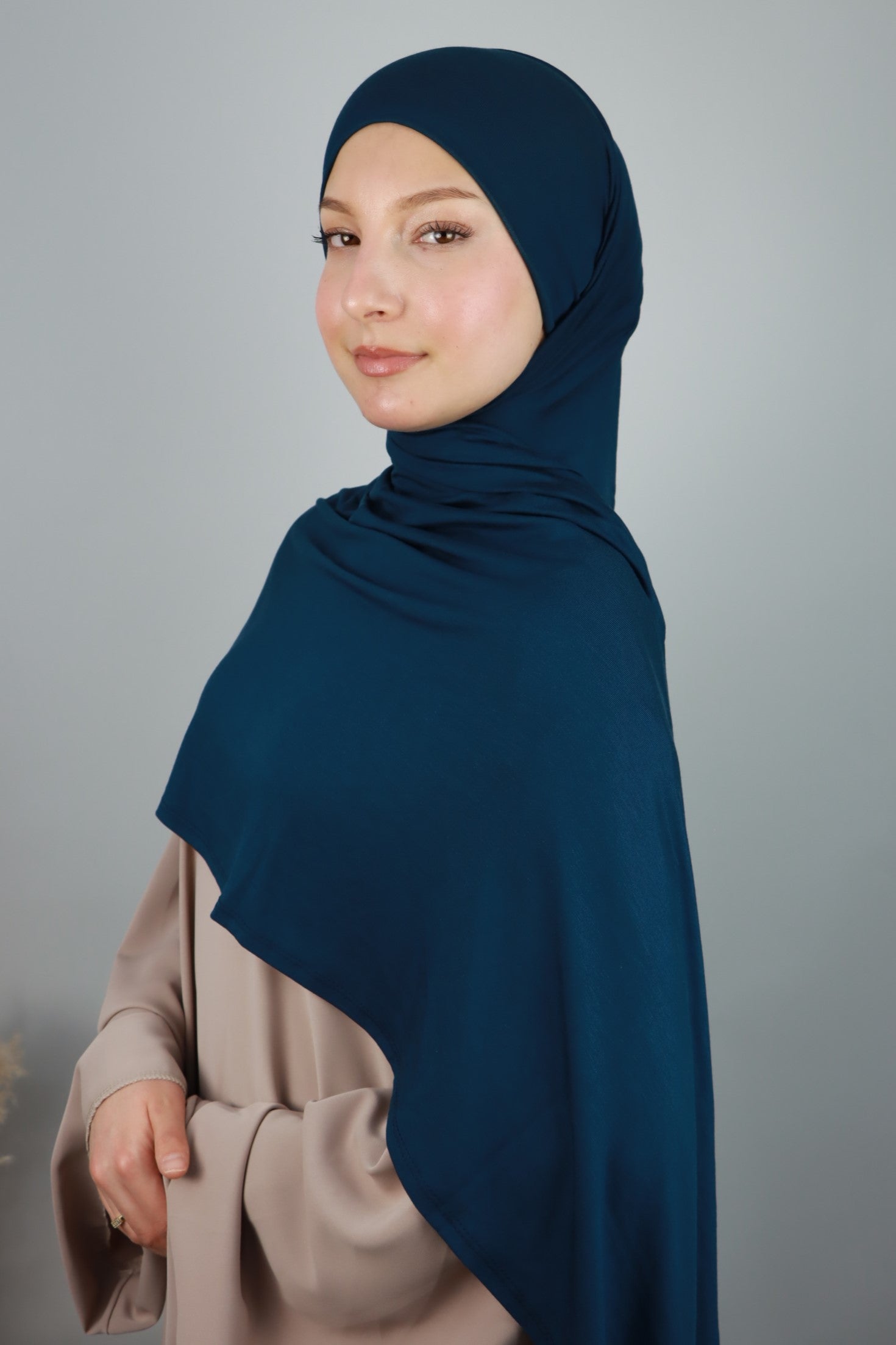JERSEY MIT INTEGRIERTEM BONNET IN PETROL